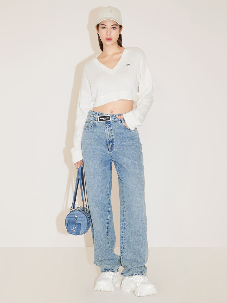 entspannte und gerade geschnittene jeans mit asymmetrischem bund