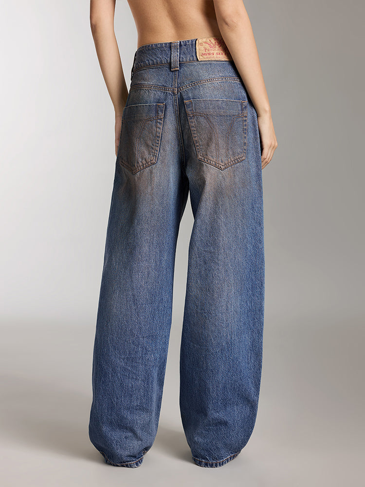 gewaschene zerrissene jeans mit weitem bein