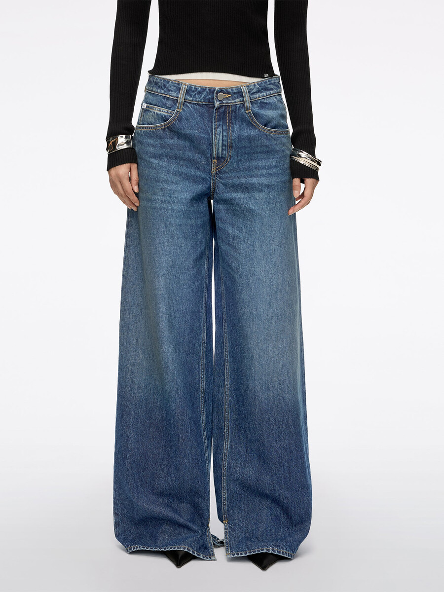 jeans mit schlitz und weitem bein