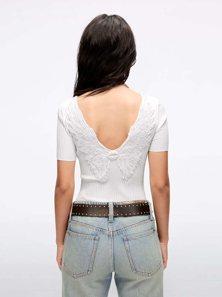 stricktop mit flügelverzierungen und perlen