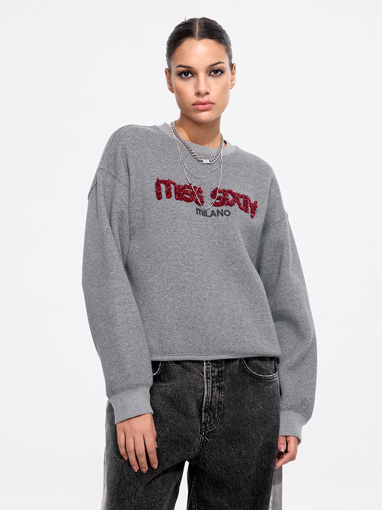 perlenbesetzter pullover