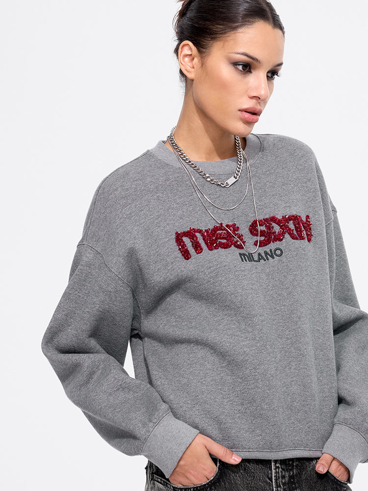 perlenbesetzter pullover